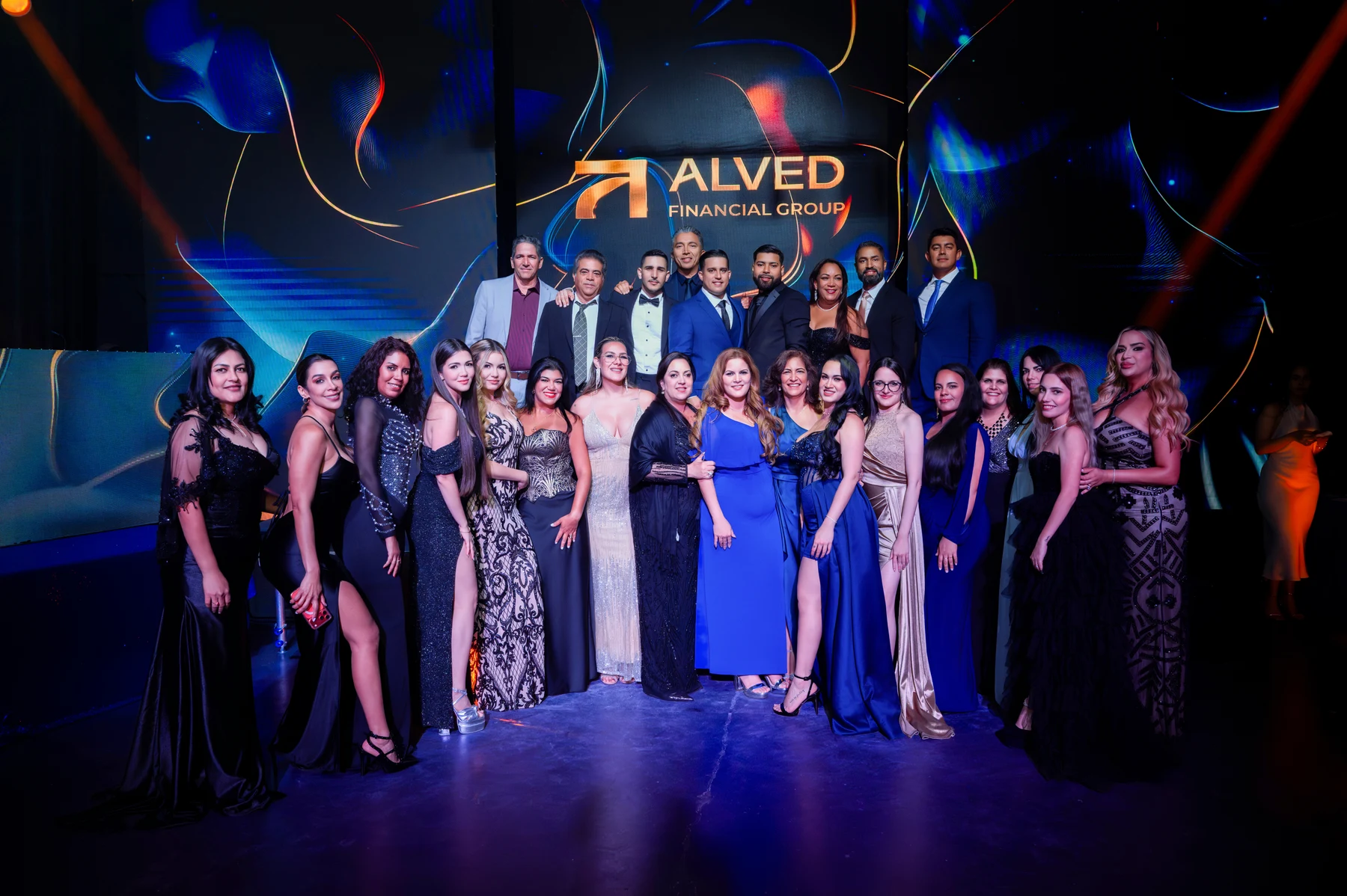 Group photo at an ALVED Financial Group event